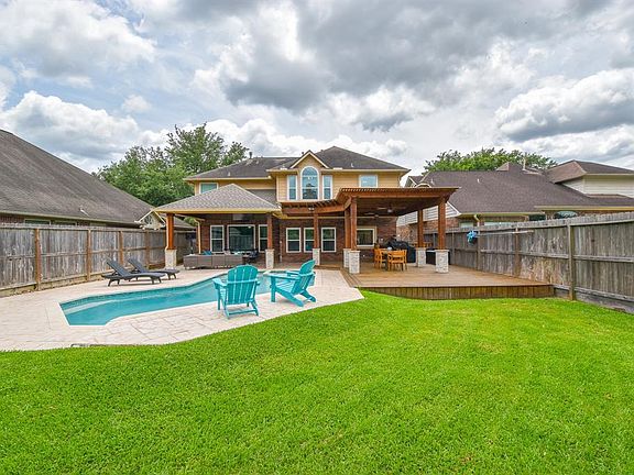 Your new backyard also includes a recently remodeled heated pool/spa and plenty of green space for additional outdoor living and entertaining.
