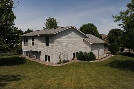 Outside, enjoy many landscaping updates including a new porch and pergola.