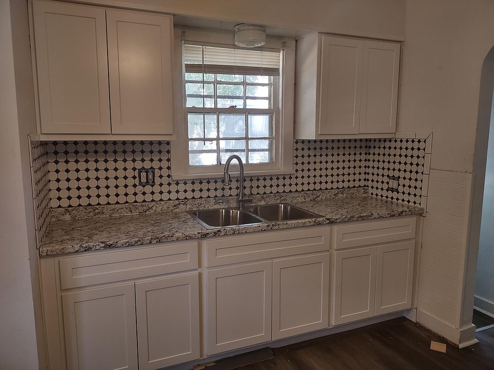 Brand new cabinets, countertop, dual sinks and faucet!