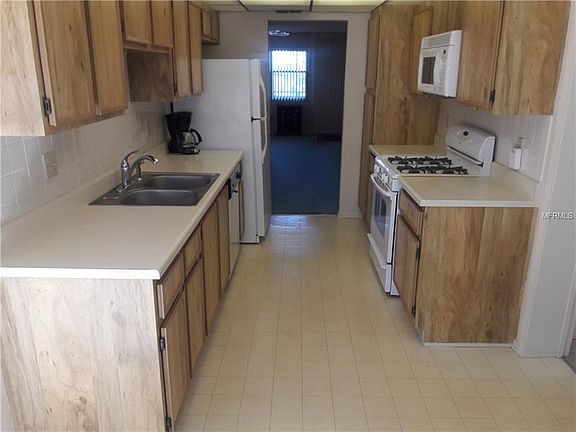 5th image of 6188 80th St N Unit 407
