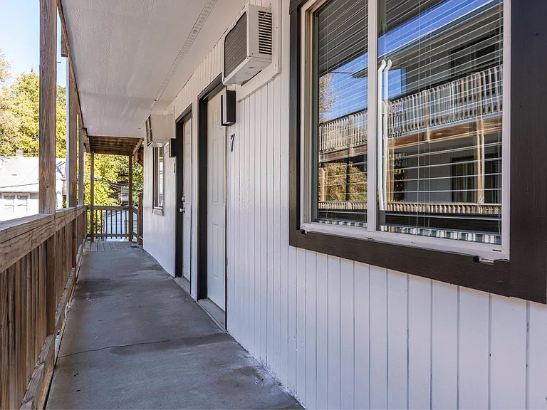Exterior of front entrances to unit at Cuming St. Apartments.