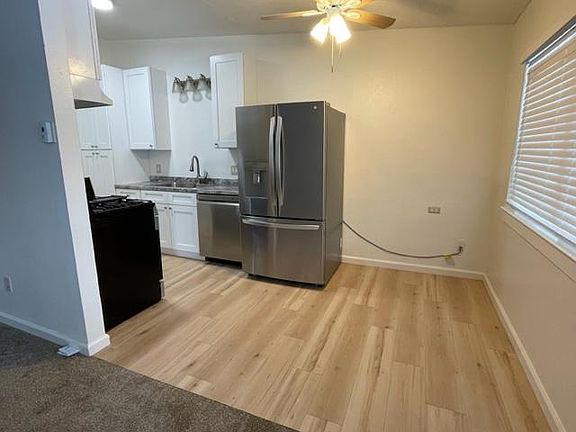 New refrigerator, flooring, blinds, carpet