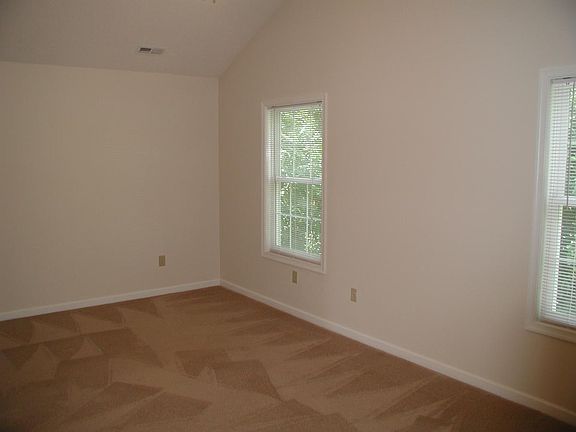 Large master bedroom, walk-in closet, ceiling fan