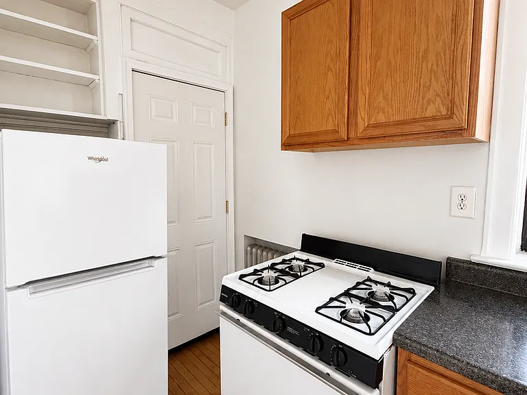 Kitchen with service door seen here- taking trash down