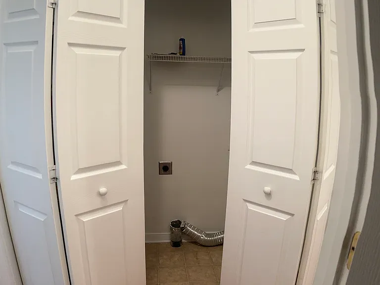Laundry closet with washer and dryer hook up