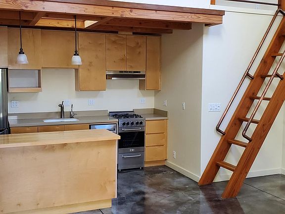 Kitchen with brand new appliances and plenty of storage and room for cooking and entertaining.