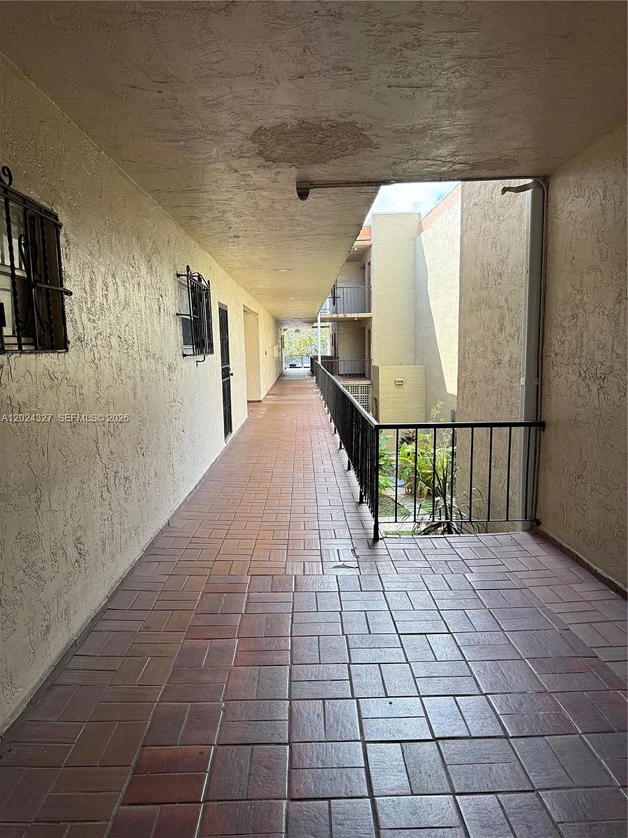 Building Photo - 6070 W 18th Ave #209