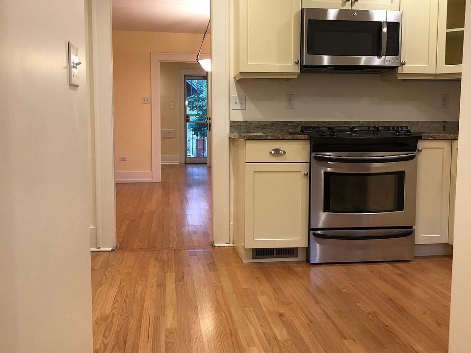 kitchen, through dining room, living room 
