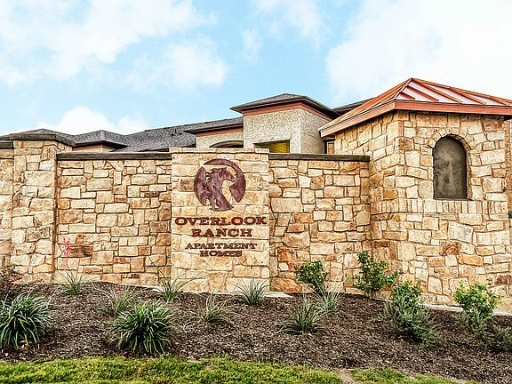 Overlook Ranch surrounded by lush green landscaping