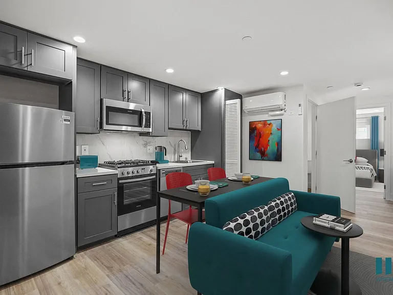 Kitchen with Stainless-Steel Refrigerator, Stove, and Dishwasher