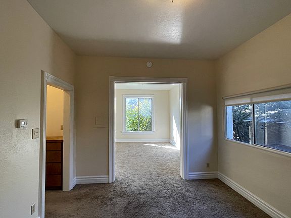 View of dining room and living room.