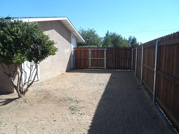 Side yard w/locked fence