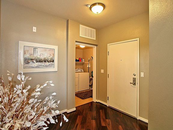 FULL LAUNDRY ROOM!  Complete with side by side washer and dryer and closet