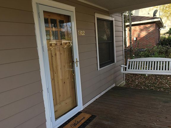 Covered porch with bench swing