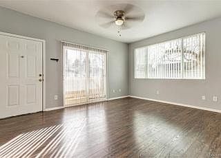 Living room with access to the patio.