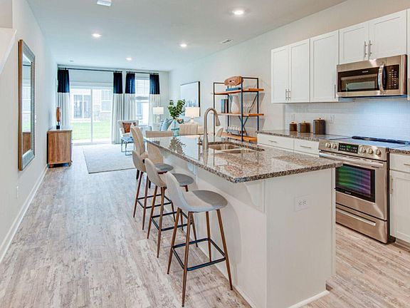 Modern Kitchen with Stainless Steel appliances. Very modern and Open floor plan.