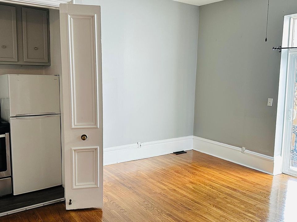 Galley kitchen and living room