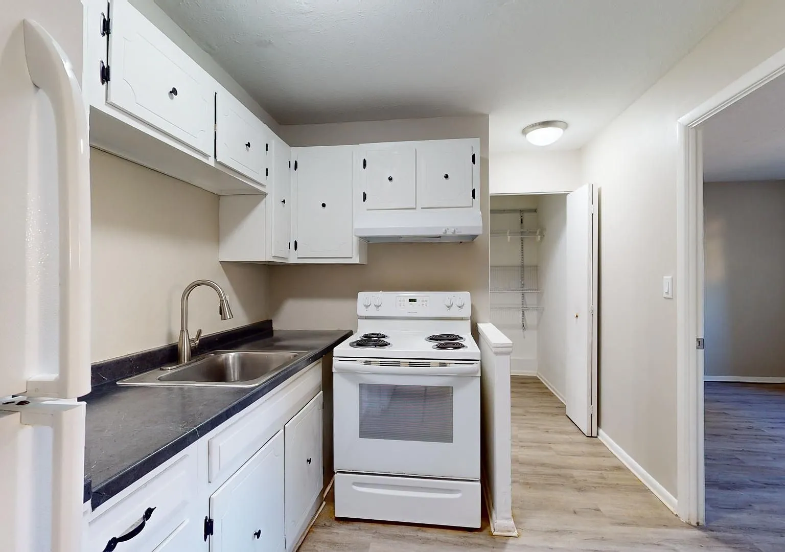 Maple Heights - 1 Bedroom - Covered Parking — Photo 1