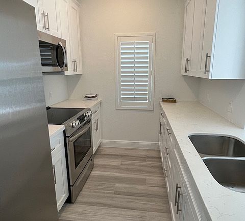 Galley kitchen. All appliances included.