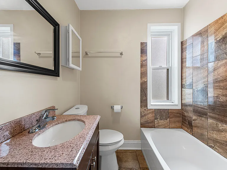 6019 Scanlan Ave #1E — Photo 8