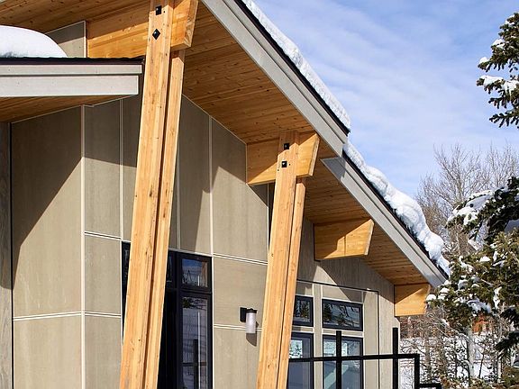 The impressive entry borrows from mid century modern architecture
