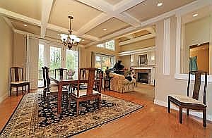 Dining room with box beam ceiling.