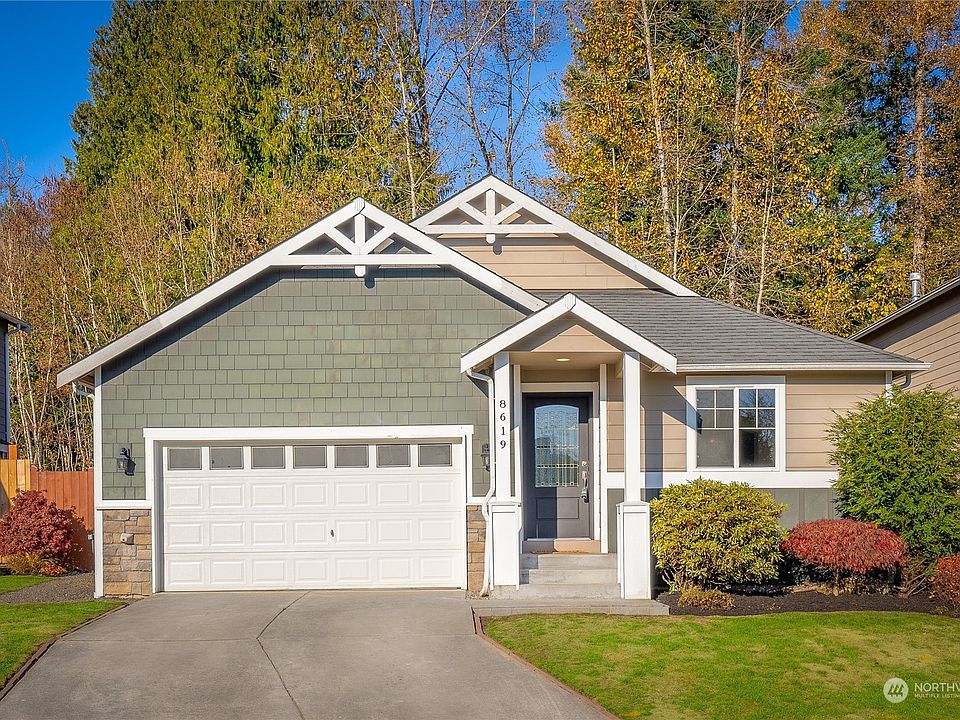 Stylish and Completely Upgraded Rambler with Private Greenbelt Yard.  >