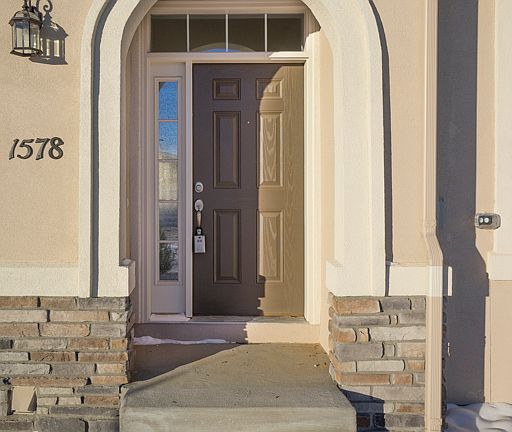 Lovely arched entry with sto