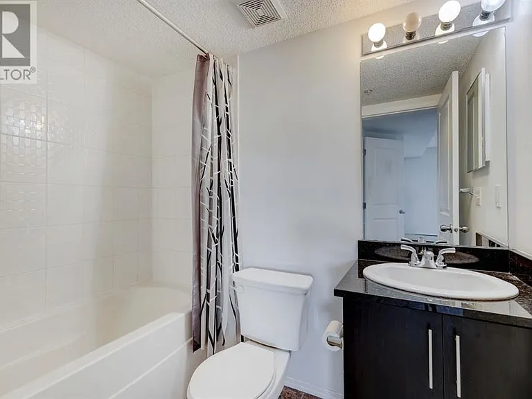 403 Mackenzie Way SW #7210 — Photo 13