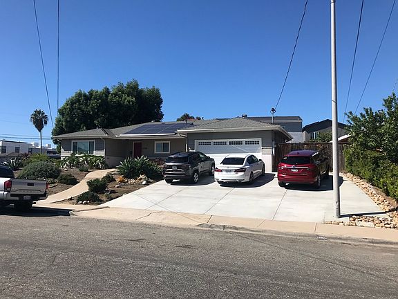 Front of House - Driveway with ample room for 3 cars