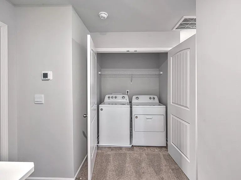 Full-size washer & dryer are included.