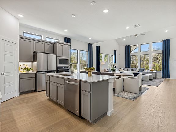Open First Floor in the Van Gogh II home plan by Trophy Signature Homes - REPRESENTATIVE PHOTO