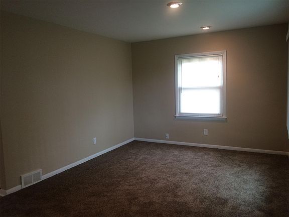 spacious living room with new carpet