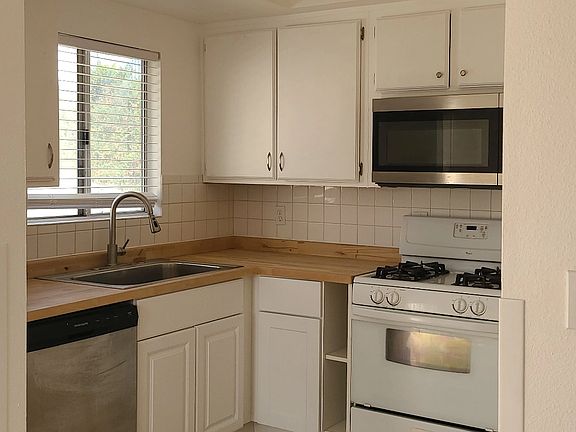 New counter top and base cabinets in kitchen