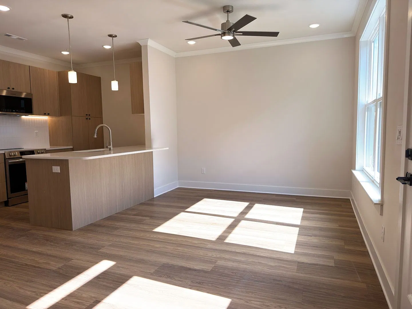 Brand-New 3-Bedroom Townhome in Rogers | Attached Garage + Internet Package — Photo 3