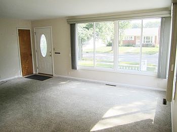 Living Room with large windows and nice natural lighting.