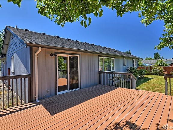 Large Trex style deck was just pressure washed. Gutters were just painted.