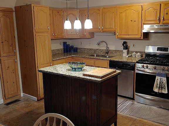 Kitchen with granite countertops