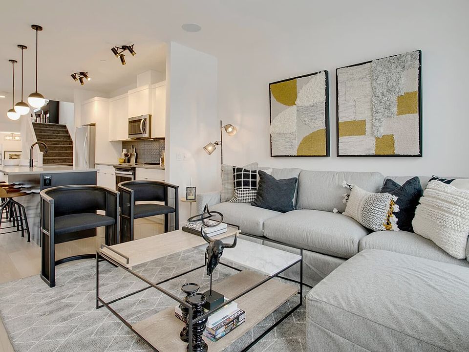 Living area in the Irvine model by Brookfield Residential in Calgary.