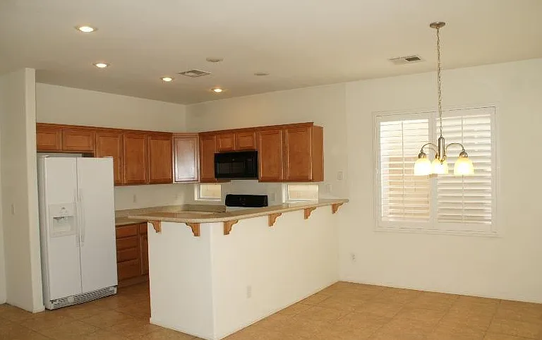5010 Whispy Breeze Ave — Photo 20