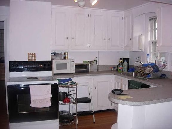 Kitchen with dishwasher and food disposal