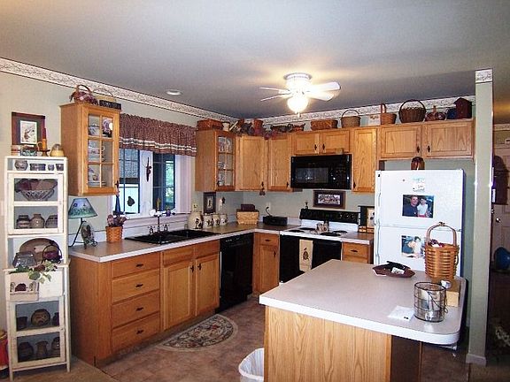 Island kitchen opens to living room for easy entertaining