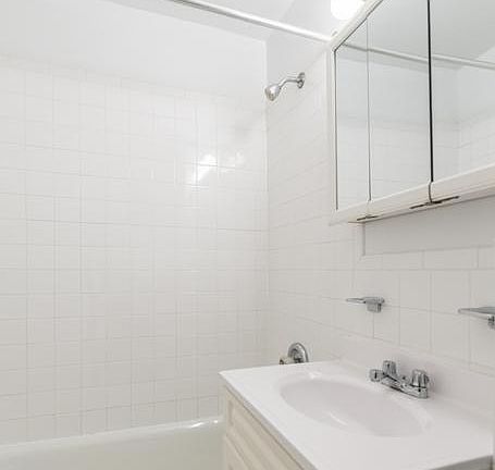 5th image of 348 E 65th St APT 4