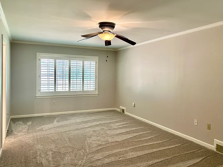 Master bedroom with two walk in closets