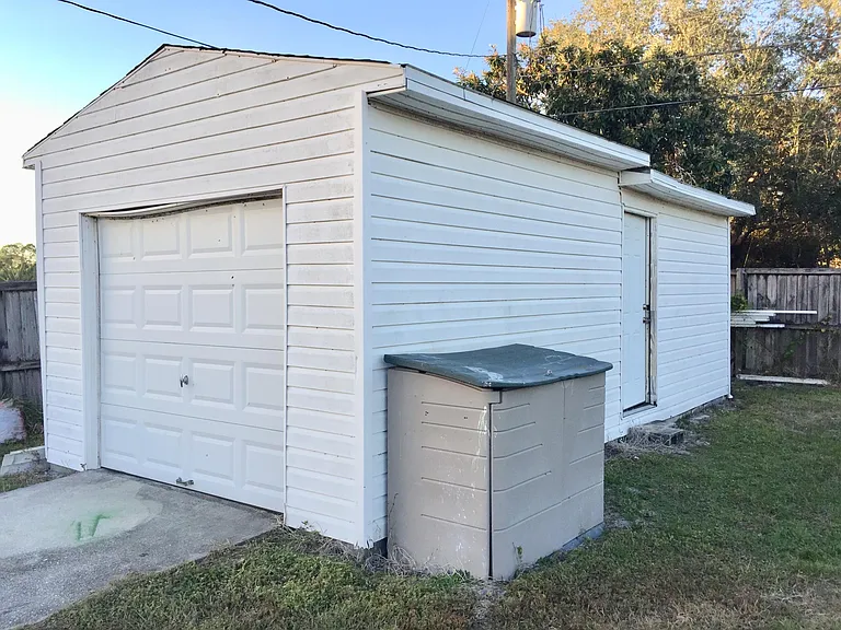Plenty of storage. 12 X 18 foot garage AND 11.5 X 11.5 storage/craft/workshop with electricity.