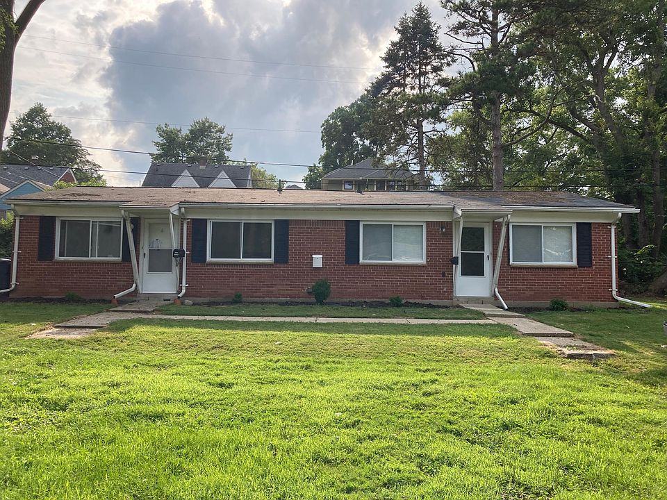 Charming all brick duplex on a quiet cul de sac. Unit on right.