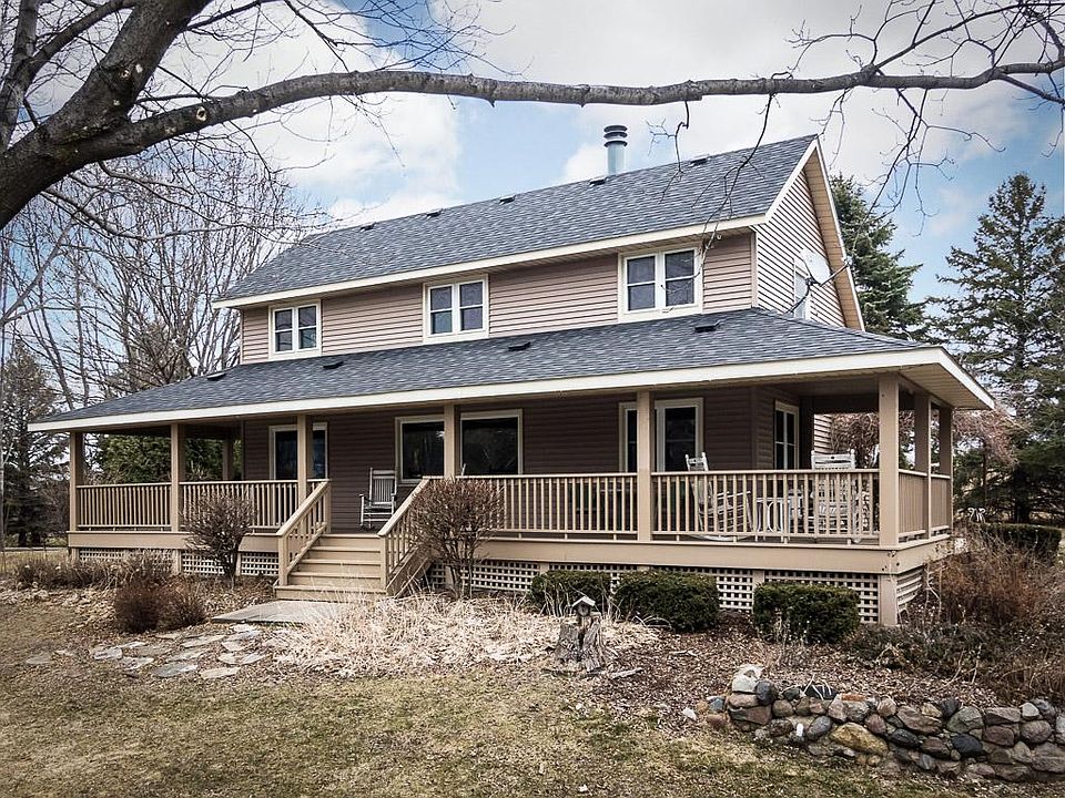 Massive wrap around porch opens to the backyard and overlooks a private pond.  A western view captures the sunsets at days end.