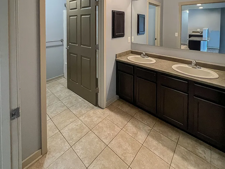 Large bathrooms with full size tubs.