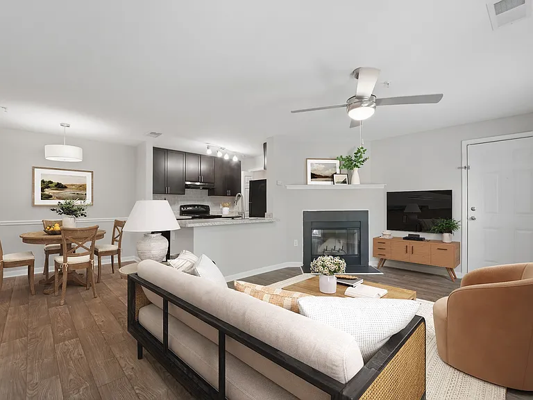 Elevate your lifestyle at Eagle Rock Apartments at Abingdon. This inviting living space features modern finishes, an open layout, and a cozy fireplace, perfect for relaxation and entertainment. Explore your new home today and make it yours!