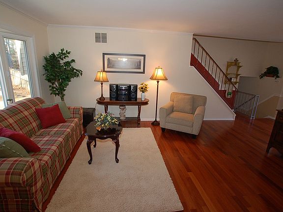 Second view of Formal Living Room with Lyptus Hardwood Flooring and bay window